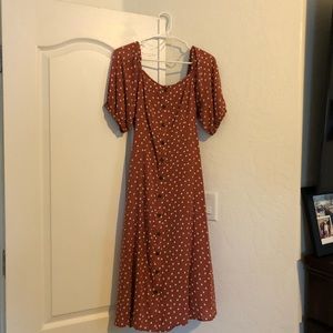 Mid Length Button front ruffle sleeve Dress.